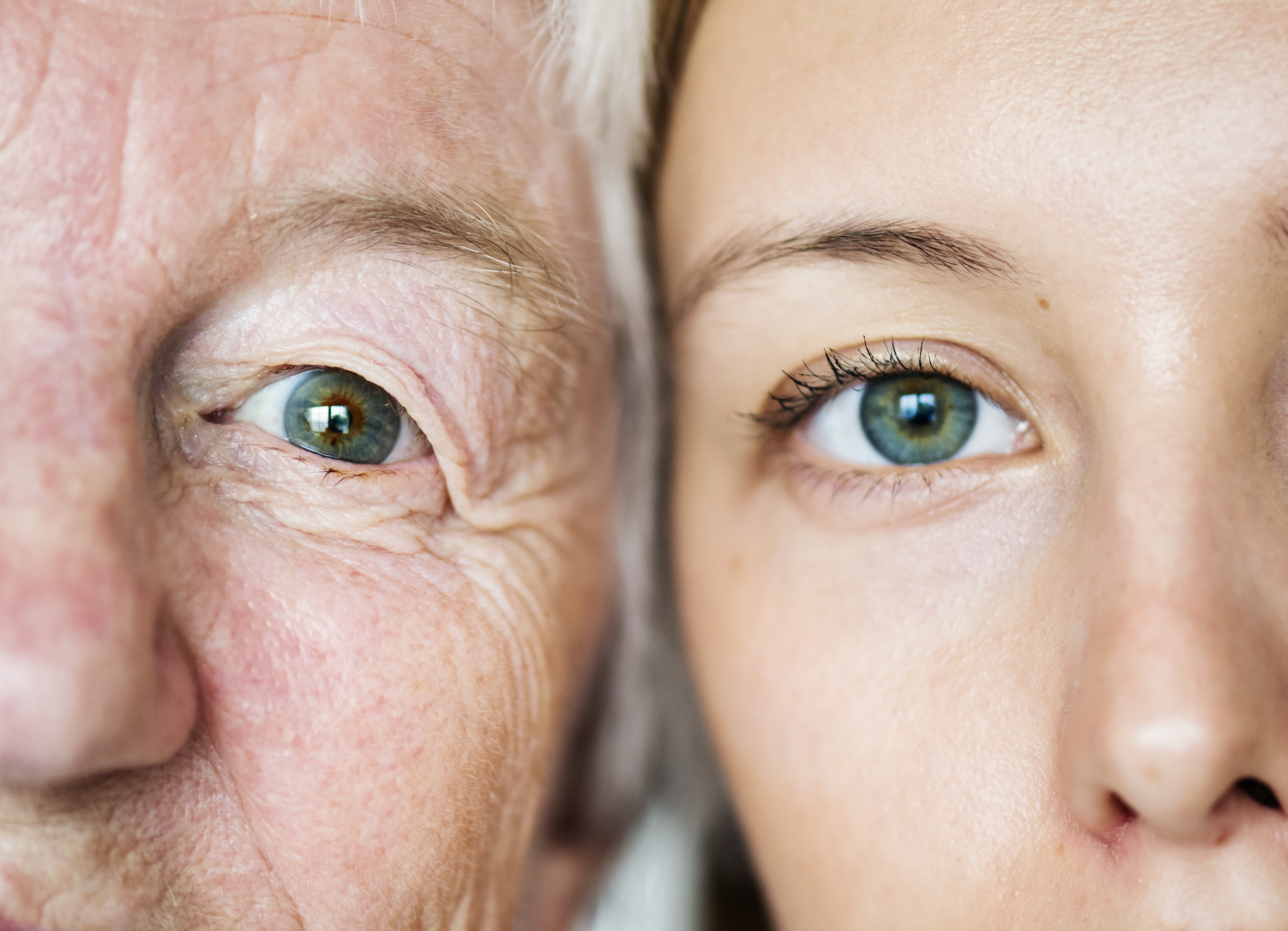 Closeup of older and younger face