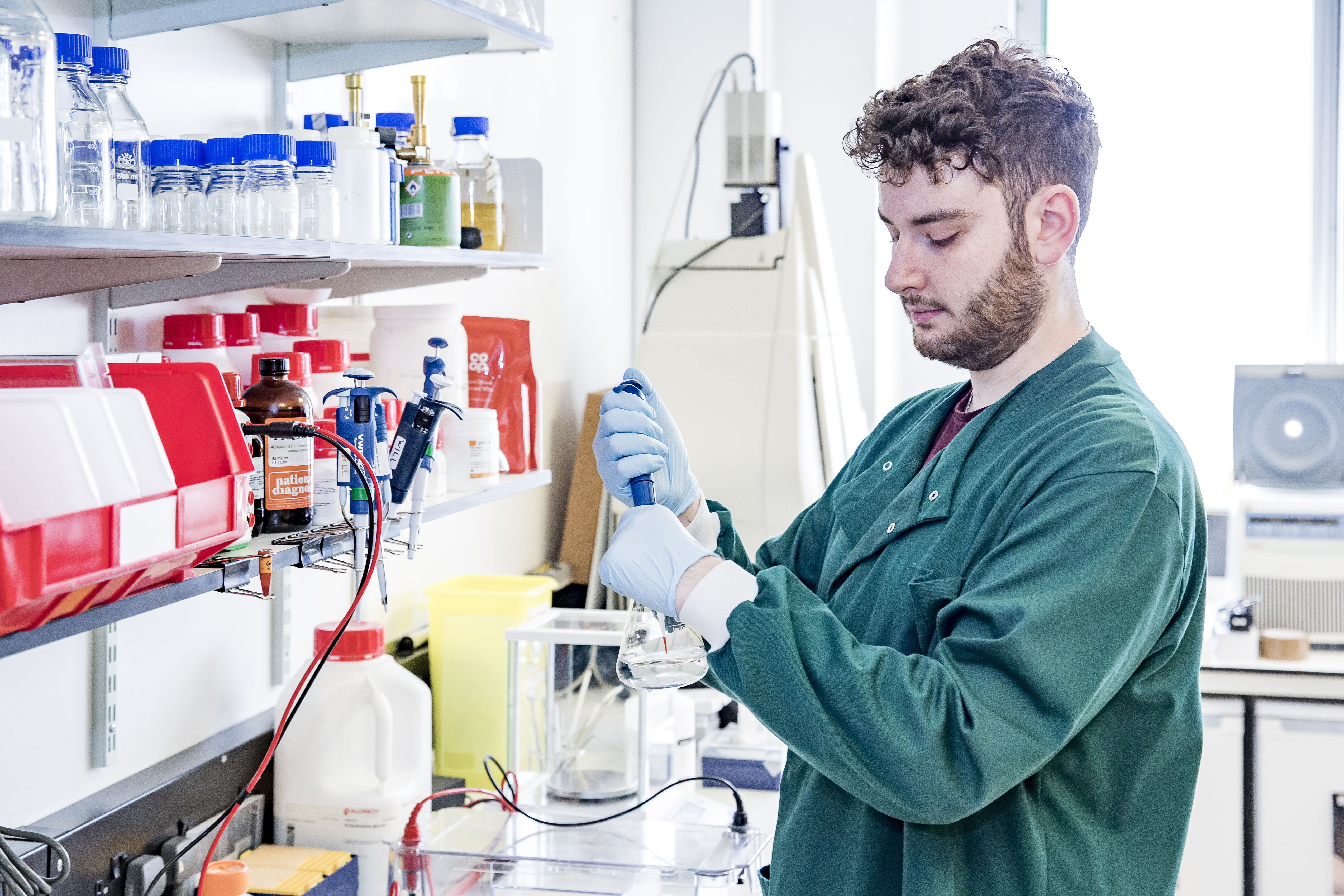 Male researcher with test tube