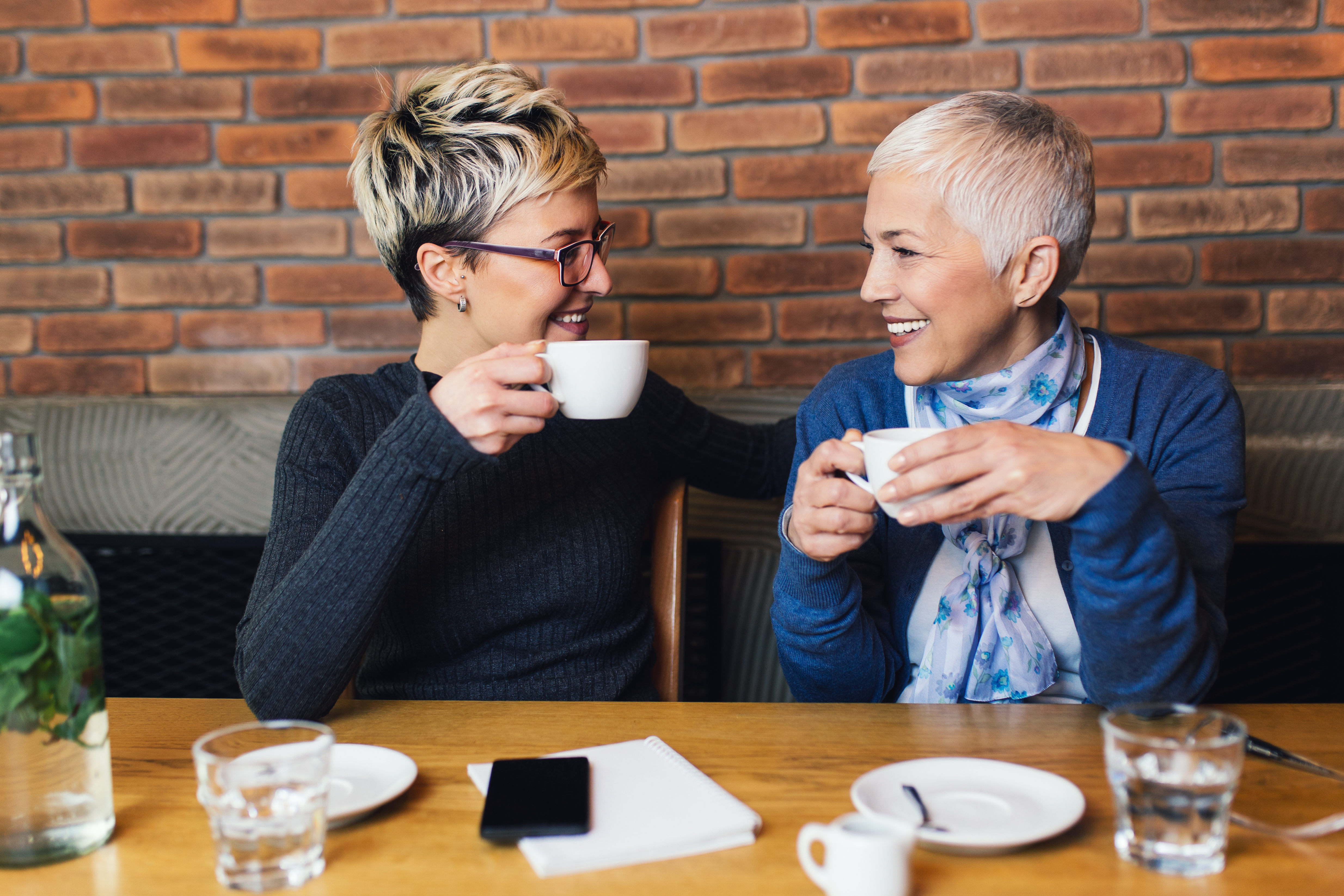 Friends drinking coffee together