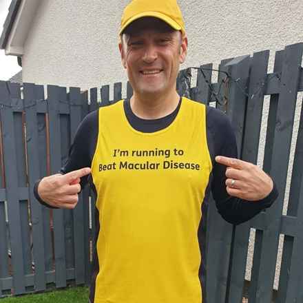 Scott Hamilton in Macular Society t-shirt 