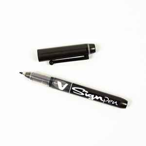 V Sign pen with cap off