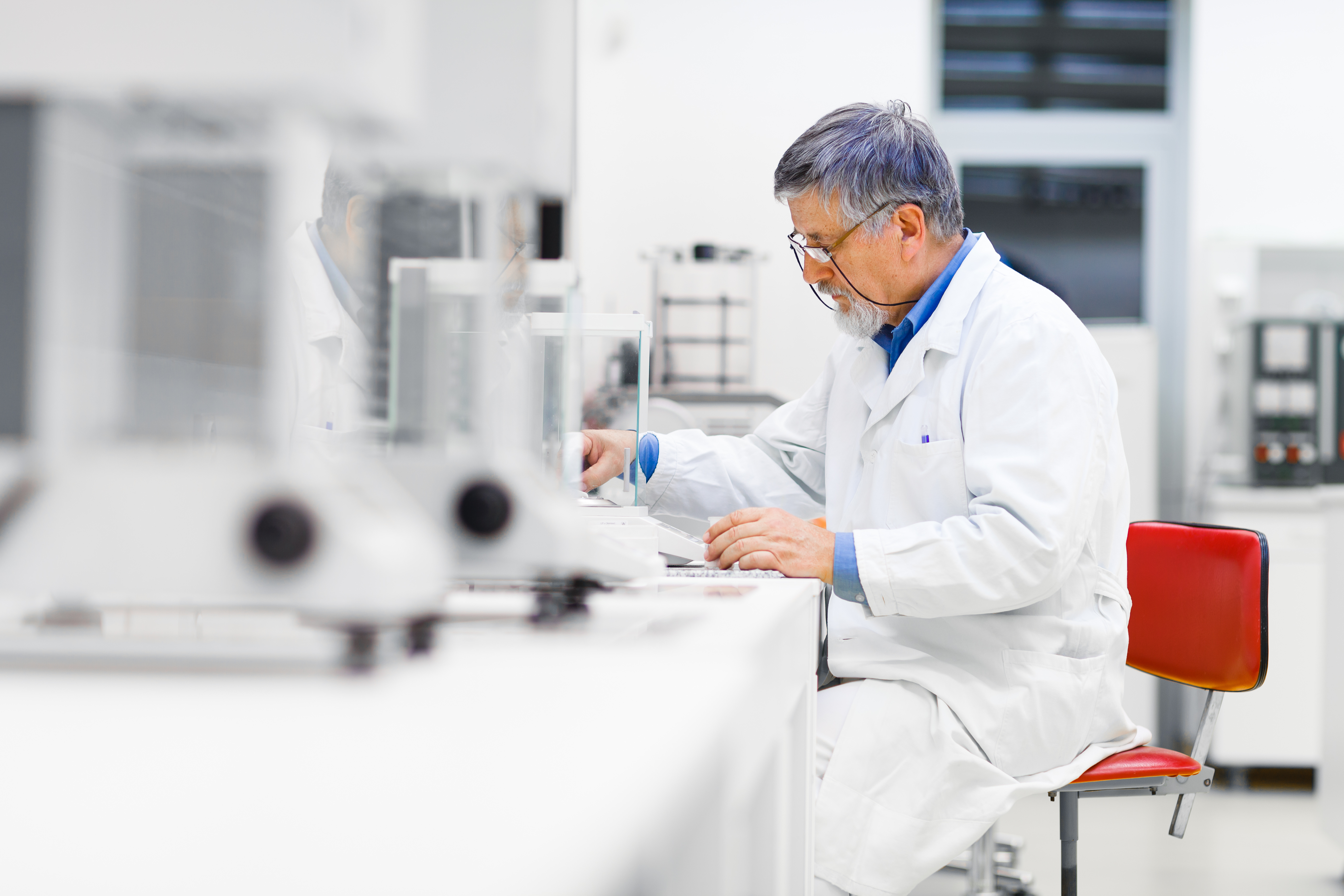 Researcher looking at notes