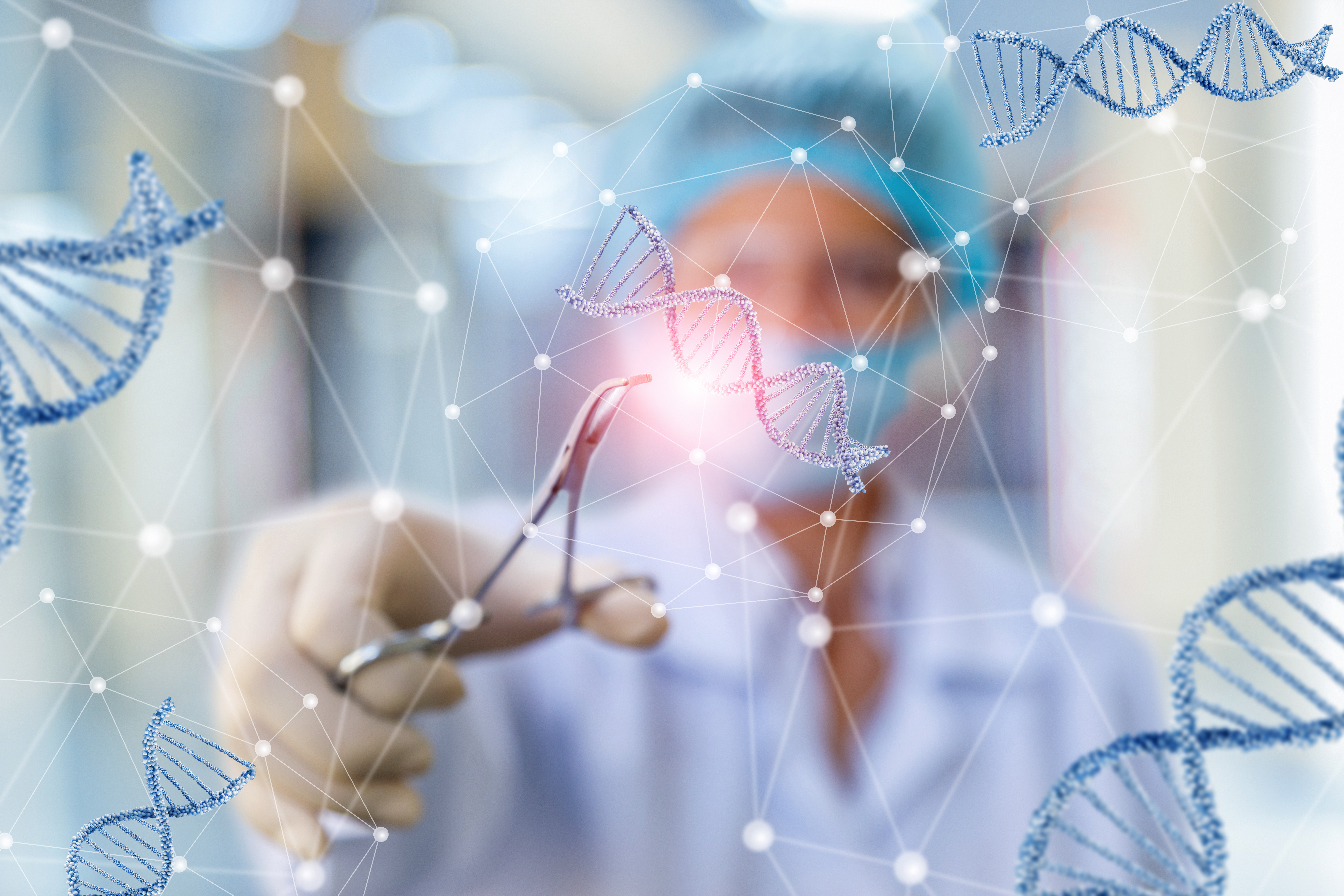Researcher with graphics of DNA